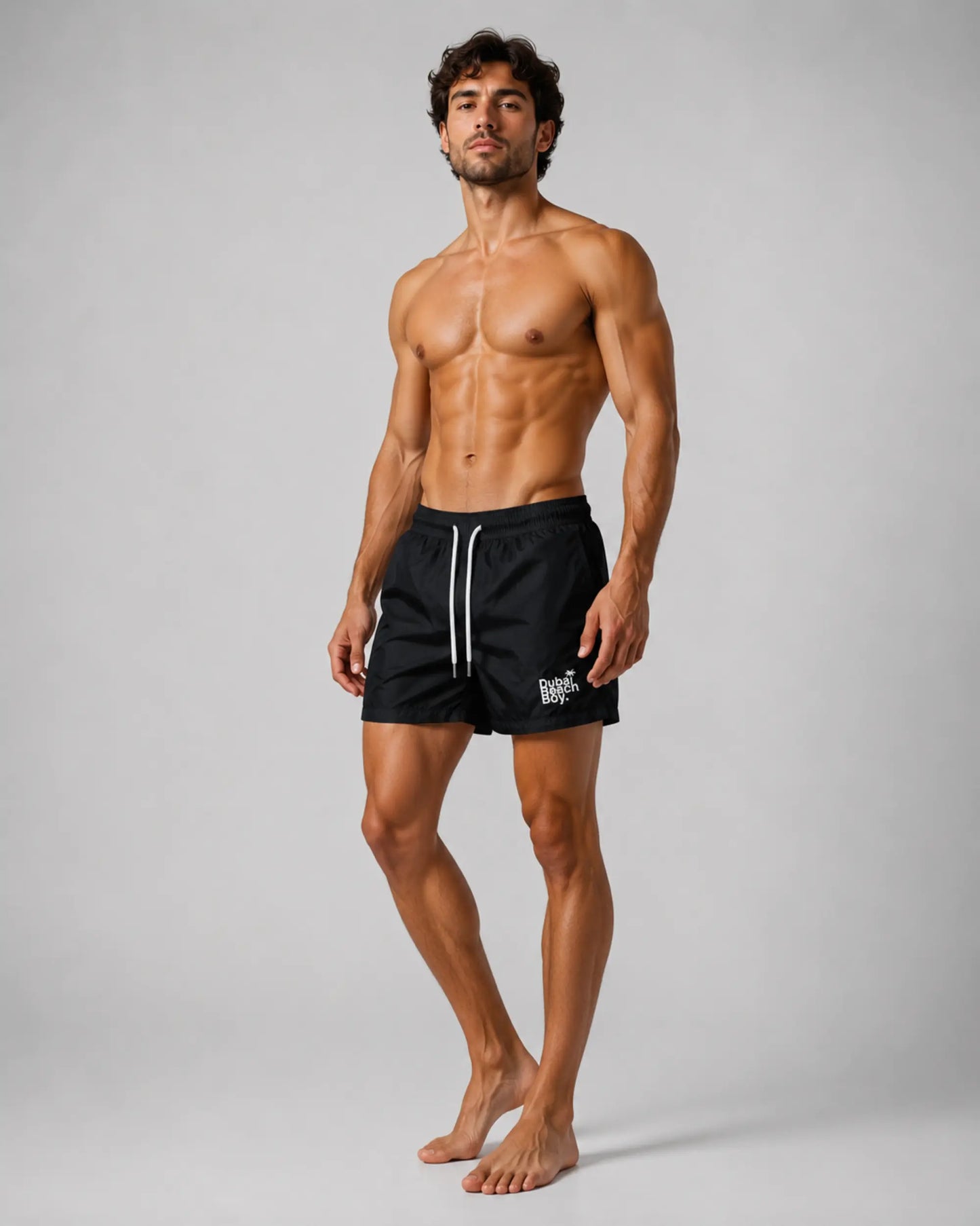 Dubai Beach Boy black swim shorts right side model pose